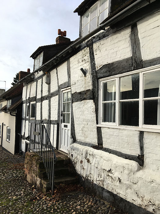 Old building, crooked beamsOld building, crooked beams