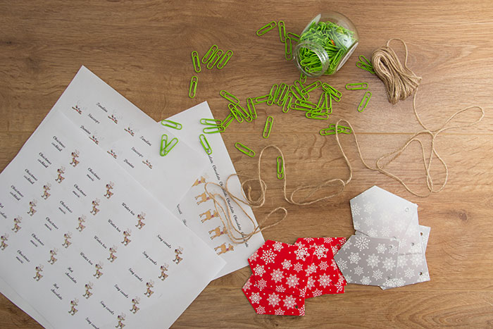 Sheets with foods, drinks, cards, clips, and string