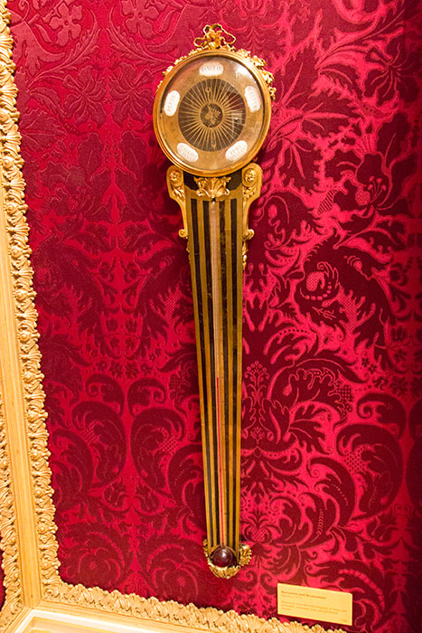Barometer and thermometer. Pearwood veneered with marquetry of brass and turteshell, mahogany back and gilt-bronze mounts.