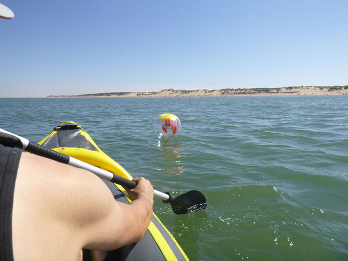 Kayaking. Finding a beach ball