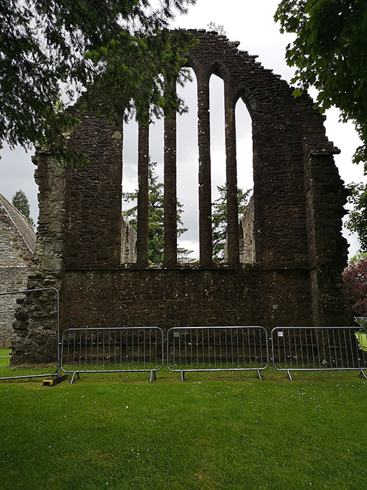 Inchmahome Priory. Ruin of wall with windows