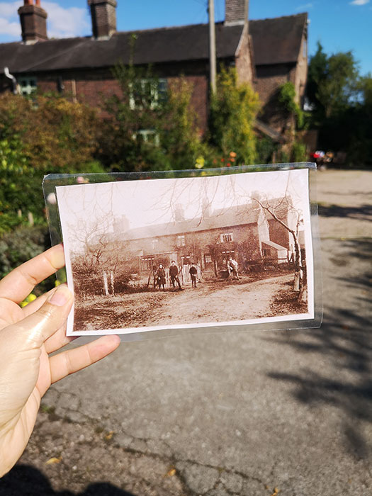  New Inn Mill. Old picture in front of the building