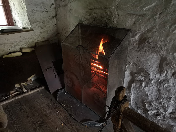  Fire burning in a building at St Fagans Museum