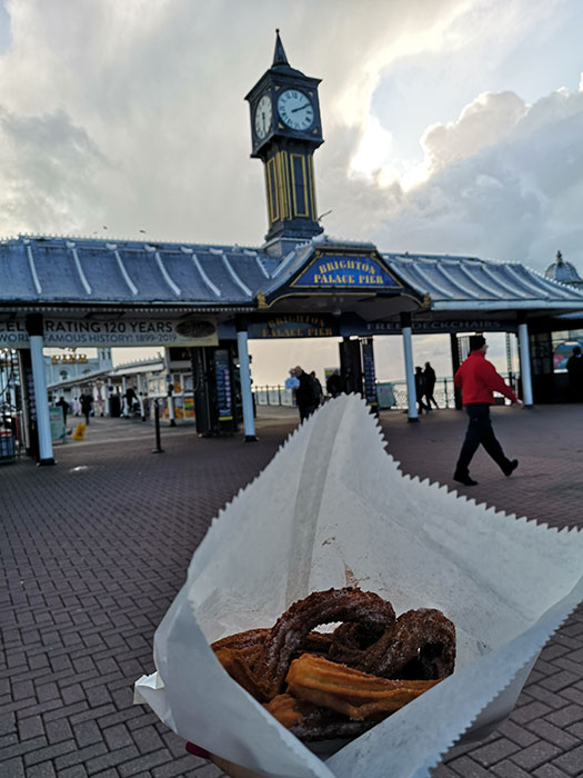 churros in front of the pier