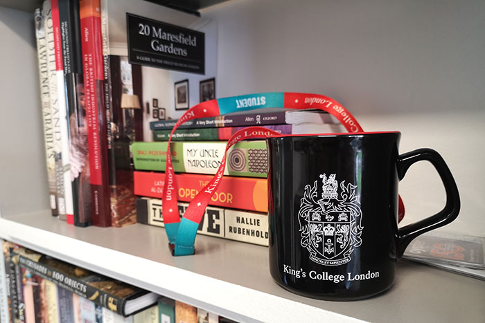 Picture of books and a mug 